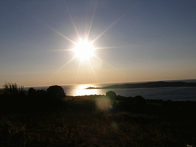 Coucher de soleil sur la tour d‚ OMIGNA vu de CARGESE