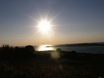 Coucher de soleil sur la tour d‚ OMIGNA vu de CARGESE (20080103)    (Photographie de Benji-Plunet) <br><A href=vos/2000/175.jpg>Afficher l'image ?</A>